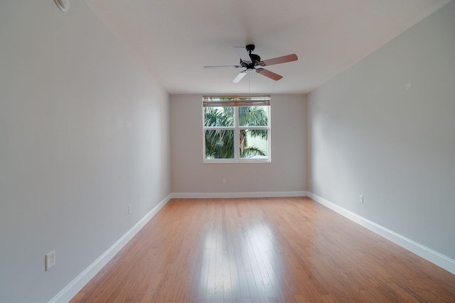 spare room featuring ceiling fan and light hardwood / wood-style floors