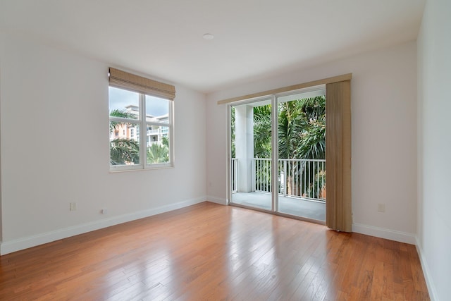 empty room featuring hardwood / wood-style flooring