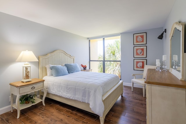 bedroom featuring dark wood-type flooring