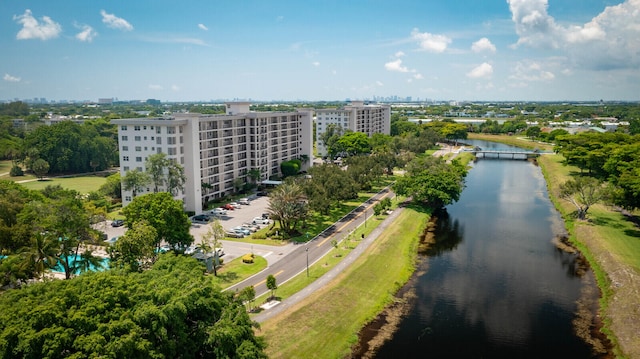 birds eye view of property featuring a water view