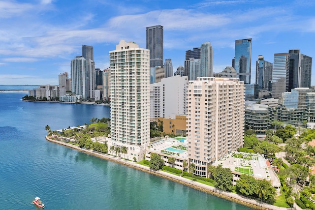 birds eye view of property featuring a water view