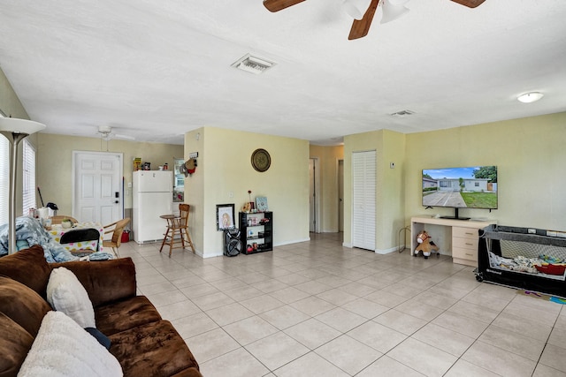 living room featuring light tile patterned floors