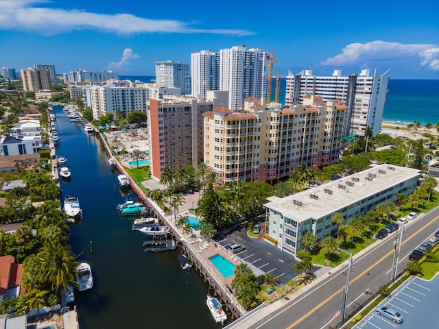 birds eye view of property featuring a water view