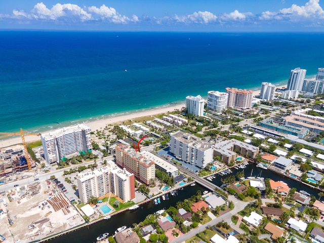 aerial view featuring a water view and a view of the beach