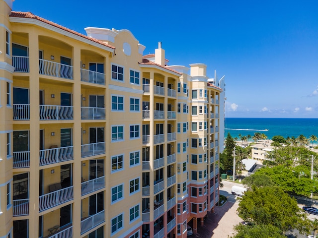 view of property with a water view