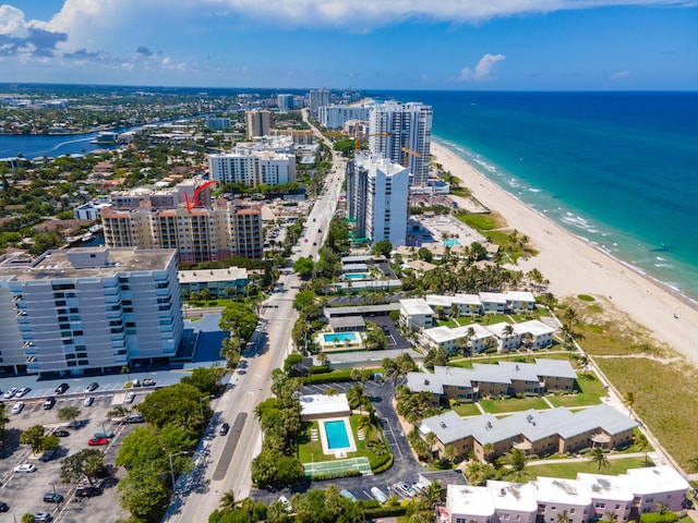 aerial view featuring a water view and a beach view