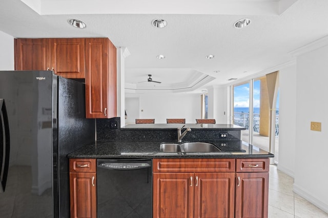 kitchen with ceiling fan, sink, dark stone countertops, crown molding, and black appliances