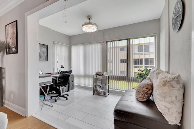 office space with light wood-type flooring