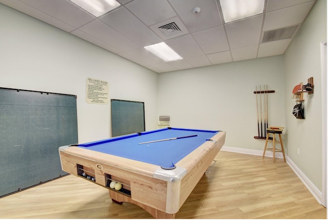 recreation room with a drop ceiling, billiards, and light hardwood / wood-style flooring