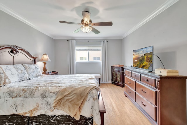 bedroom with ceiling fan, light hardwood / wood-style flooring, and ornamental molding