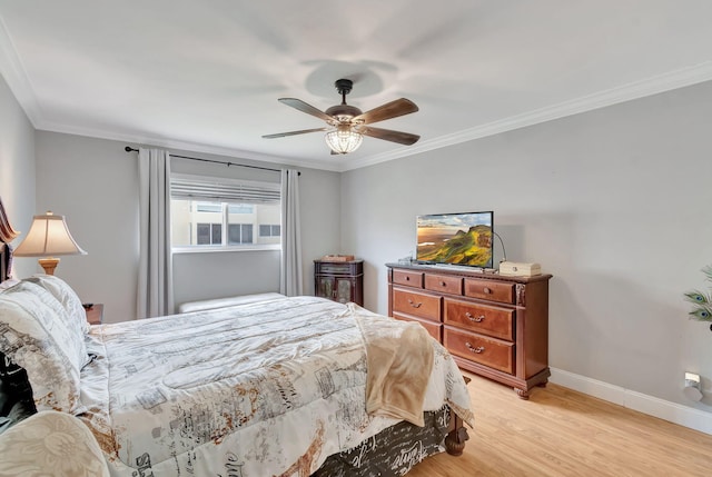 bedroom featuring light hardwood / wood-style floors, ceiling fan, and ornamental molding