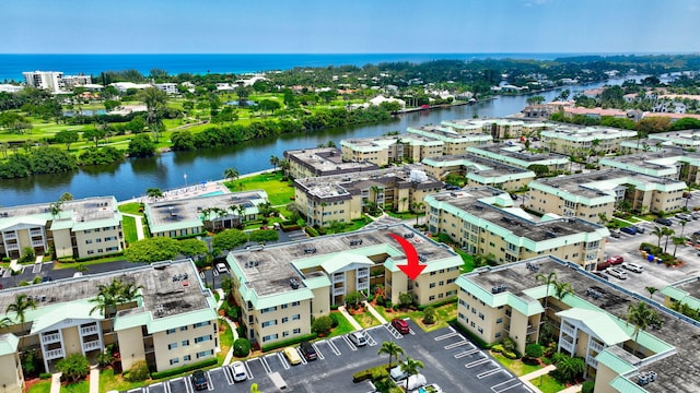 drone / aerial view featuring a water view