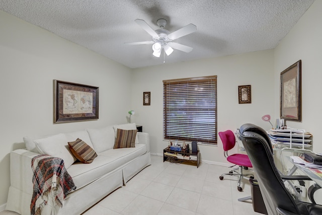 office area featuring ceiling fan and a textured ceiling