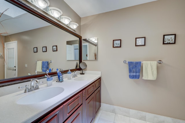 bathroom featuring tile patterned floors and vanity