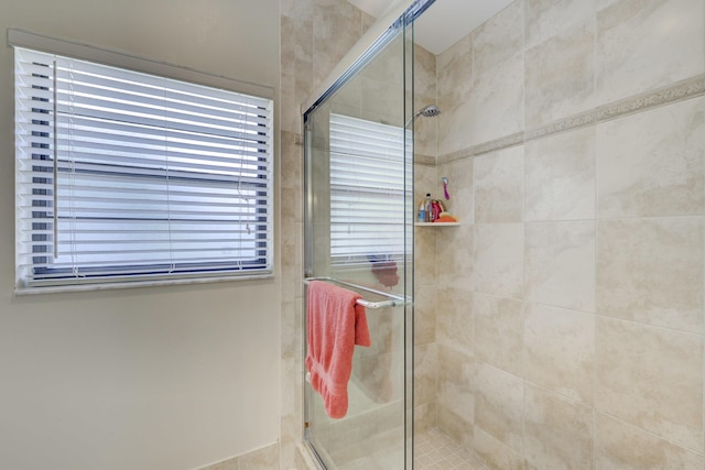 bathroom with an enclosed shower