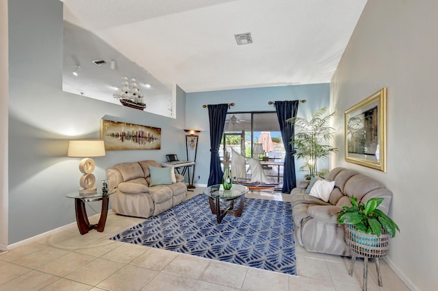 living room featuring light tile patterned floors and lofted ceiling