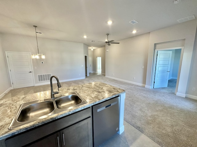 kitchen with stainless steel dishwasher, ceiling fan with notable chandelier, light colored carpet, sink, and pendant lighting