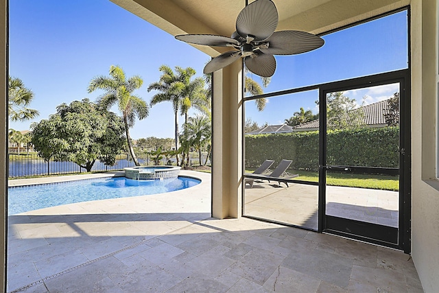 view of pool featuring an in ground hot tub and a patio area