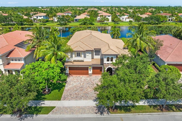 aerial view with a water view and a residential view