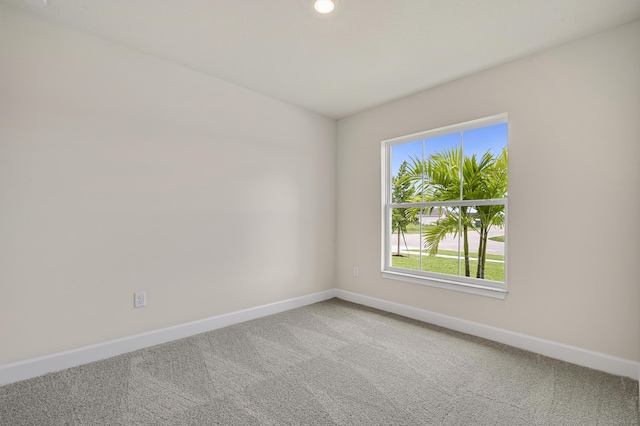 interior space featuring a wealth of natural light, a water view, and a notable chandelier