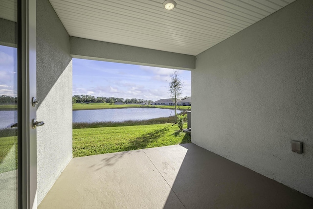 view of patio / terrace with a water view