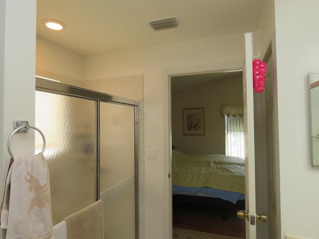 bathroom with an enclosed shower