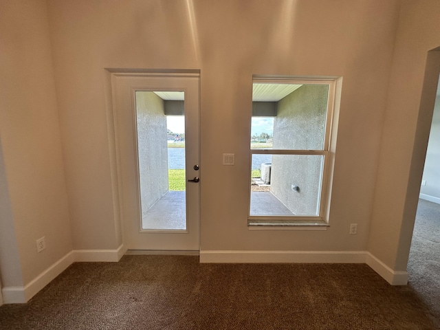 view of patio with central air condition unit and a water view