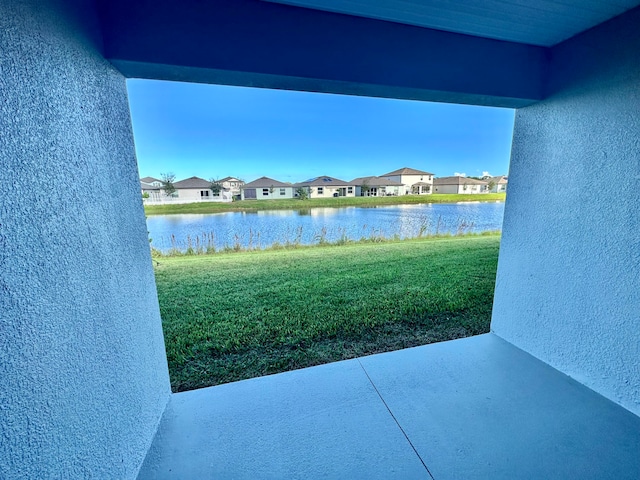 view of patio / terrace with a water view