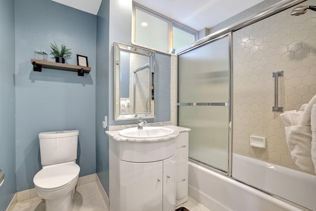 full bathroom with tile patterned flooring, vanity, toilet, and enclosed tub / shower combo