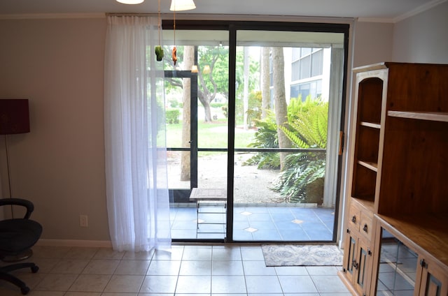 doorway to outside with light tile patterned floors and crown molding