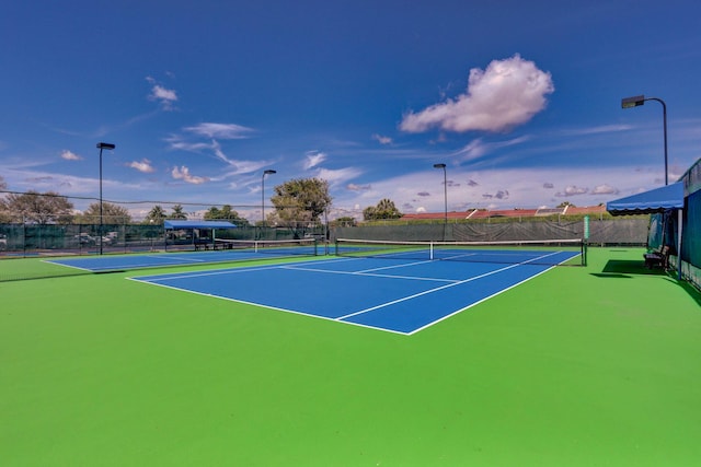 view of tennis court with basketball court