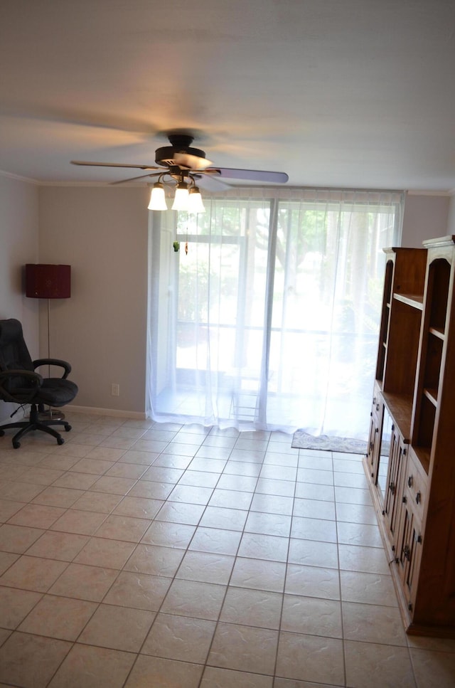 unfurnished room featuring ceiling fan and light tile patterned flooring