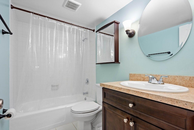 full bathroom featuring tile patterned floors, vanity, toilet, and shower / bathtub combination with curtain