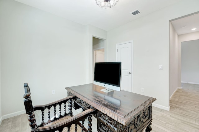 home office featuring light wood-type flooring