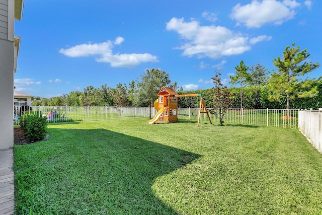 view of yard with a playground