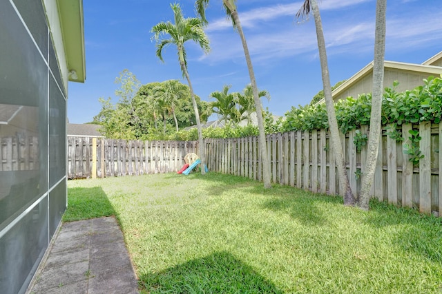 view of yard featuring a fenced backyard