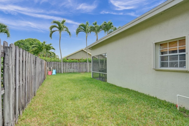 view of yard featuring a fenced backyard