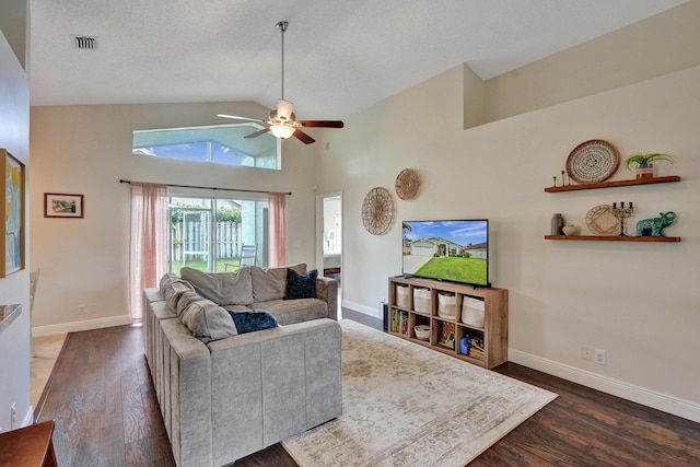 living area featuring ceiling fan, baseboards, visible vents, and dark wood finished floors