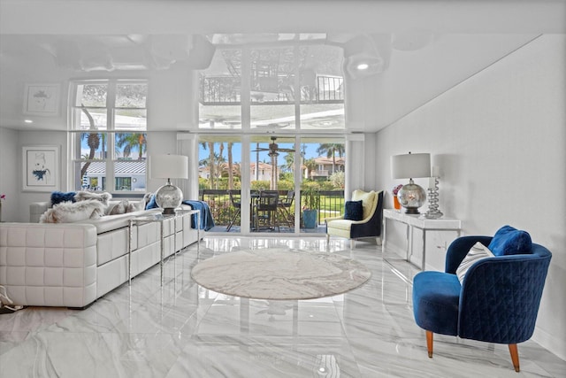 living room with a towering ceiling