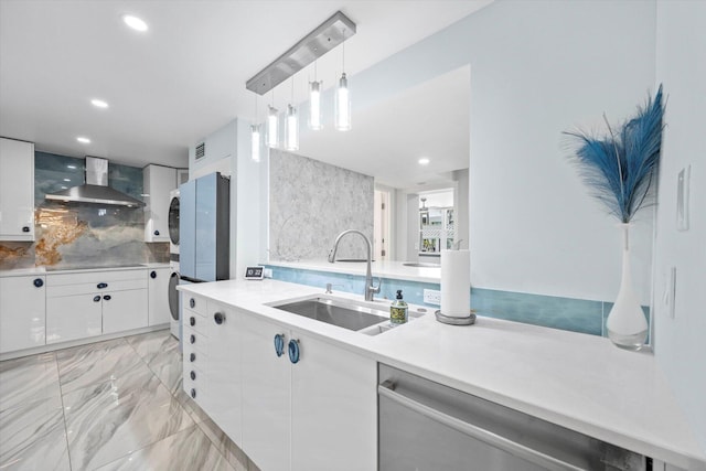 kitchen featuring kitchen peninsula, white cabinetry, and a breakfast bar area