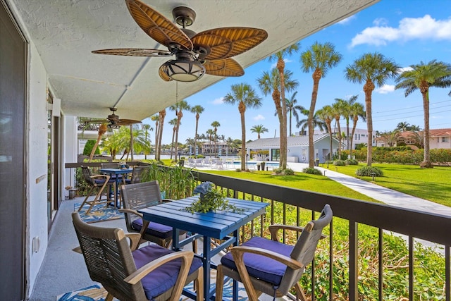 balcony featuring ceiling fan