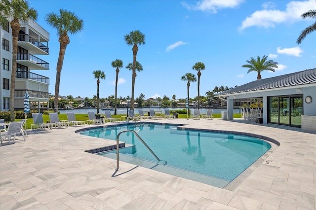 view of pool featuring a patio area