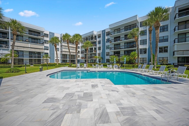 view of pool featuring a patio