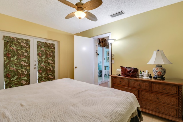 bedroom featuring french doors, ceiling fan, a textured ceiling, and access to outside