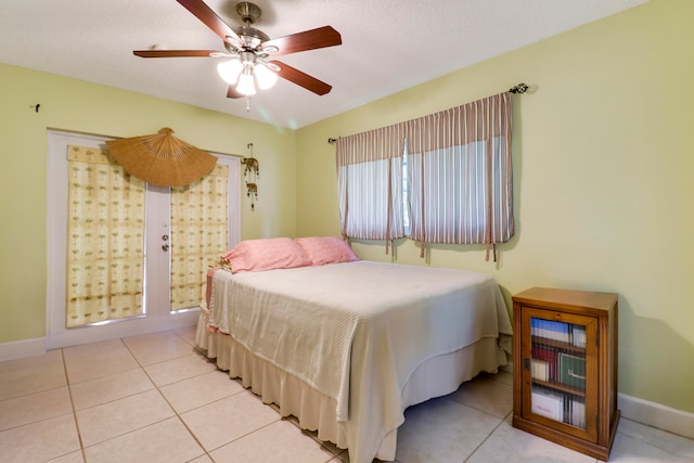 bedroom with tile flooring and ceiling fan