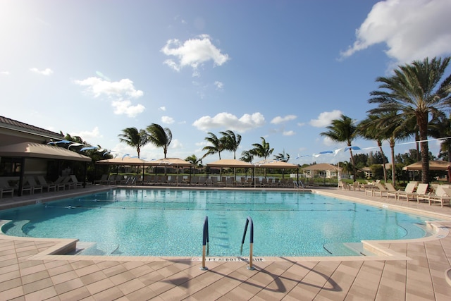 view of swimming pool featuring a patio area