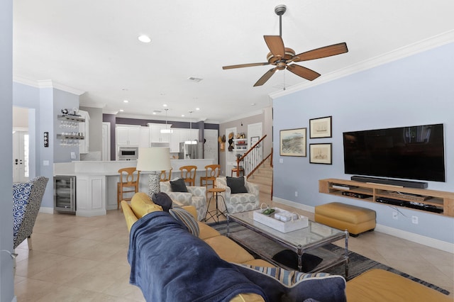 tiled living room featuring ceiling fan, beverage cooler, and crown molding