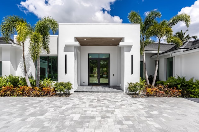 entrance to property featuring french doors