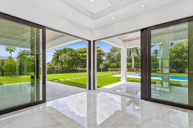 doorway to outside featuring a wealth of natural light