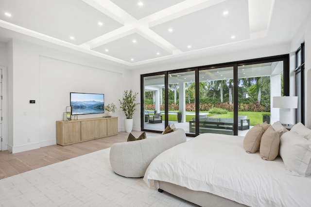 bedroom with access to exterior, beamed ceiling, light hardwood / wood-style floors, and coffered ceiling